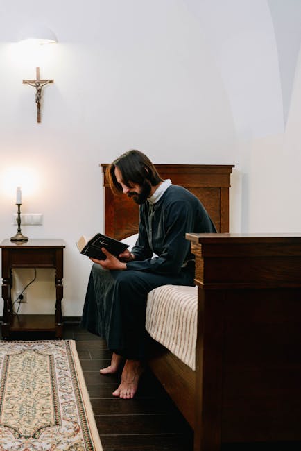 A focused individual reading religious texts