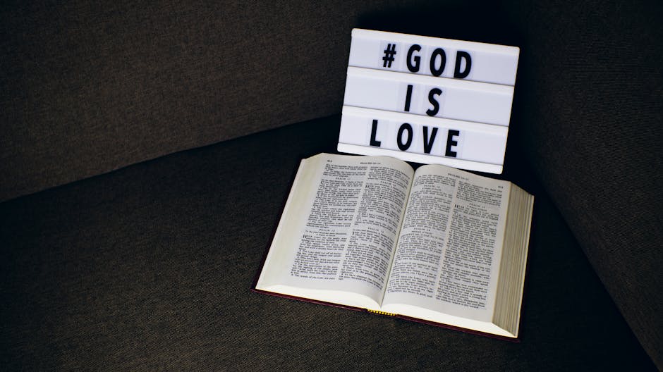 Message stating God is Love next to a Bible